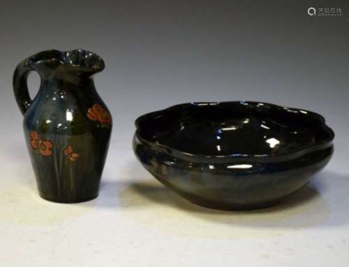 Local Interest - Two items of Elton (Clevedon) pottery comprising a butterfly-decorated jug with
