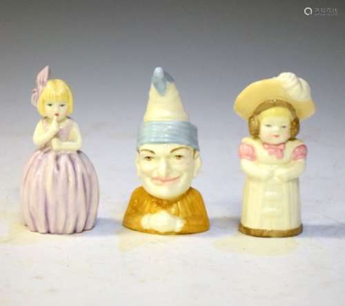 Three Royal Worcester porcelain candle snuffers comprising Punch, Hush and Feathered Hat (3)