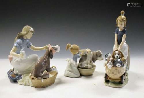 Three Lladro porcelain figure groups featuring dogs, comprising: 5455 Bashful Bather, 05921 Take