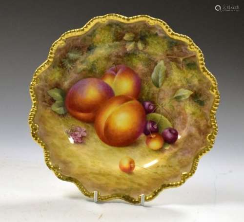 Royal Worcester porcelain fruit-painted plate of wavy-edged form decorated with peaches and