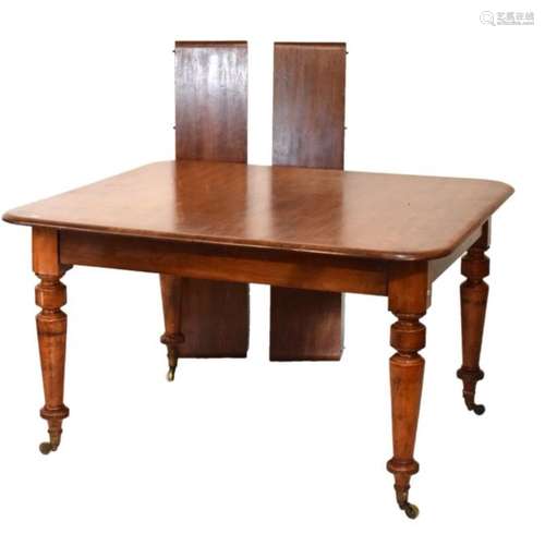 19th Century mahogany rectangular extending dining table fitted two insertions on turned supports