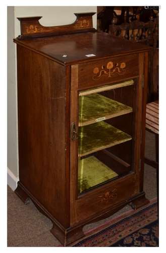 Edwardian mahogany Art Nouveau-style music cabinet, fitted one bevelled glass door enclosing three