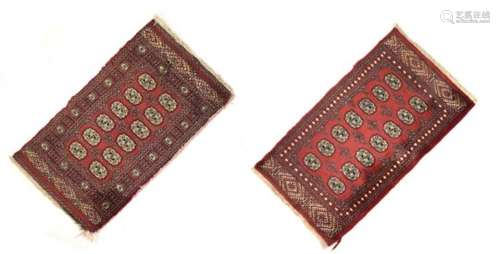 Near pair of small 20th Century Middle Eastern rugs of Tekke Turkoman or Belouch Afghan type, having