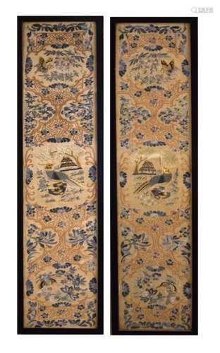 Pair of Oriental embroidered silk sleeve panels depicting butterflies and exotic birds, in