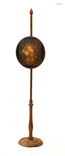 Mahogany polescreen, the circular screen with applied printed still life of flowers, 133cm wide