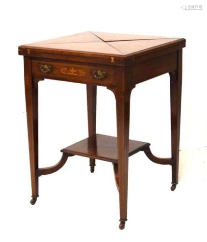Edwardian mahogany and string inlaid marquetry decorated envelope card table having baize
