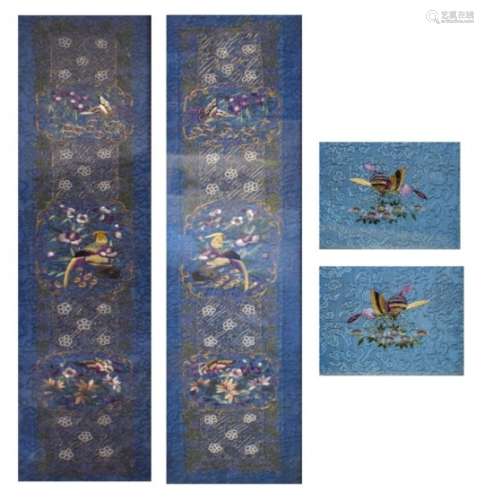Two Chinese embroidered silk sleeve panels, each decorated with birds and butterflies on a mid-