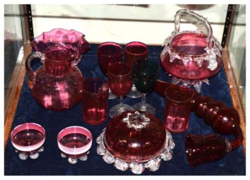 Selection of Victorian and later cranberry glass to include; a novelty pipe, basket, bowl, jug, pair