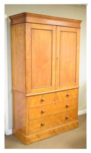 Victorian satinwood linen press, the upper section with moulded cornice over twin doors enclosing