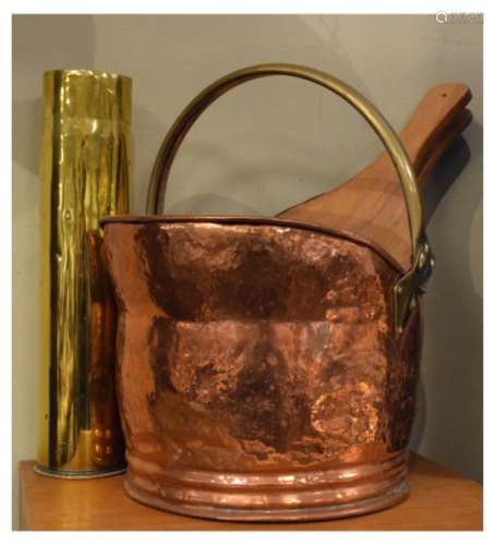 Copper coal helmet with brass handle, brass shell vase and pair of bellows