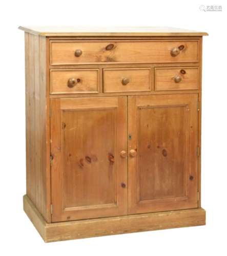 Stained pine cabinet with moulded rectangular top over one long and three short drawers over twin