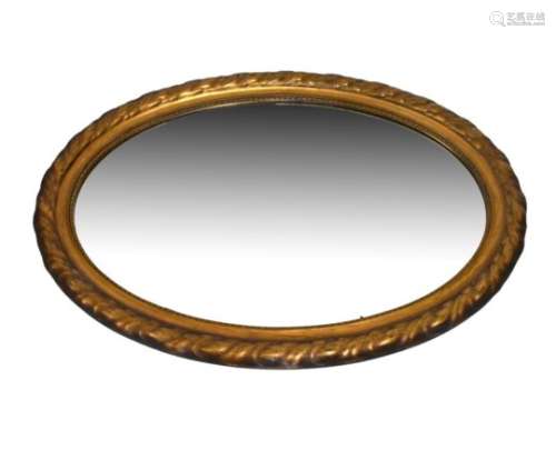 Early 20th Century oval wall mirror with bevelled plate in moulded rope-twist surround, 89cm high