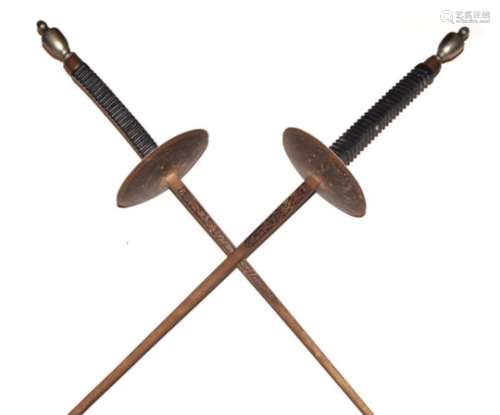 Pair of reproduction fencing foils