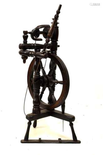 19th Century treen spinning wheel of baluster-turned construction with six-spoke wheel and foot-