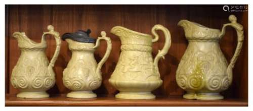 Four mid 19th Century relief-moulded buff stoneware jugs, to include; W. Ridgway & Co, largest