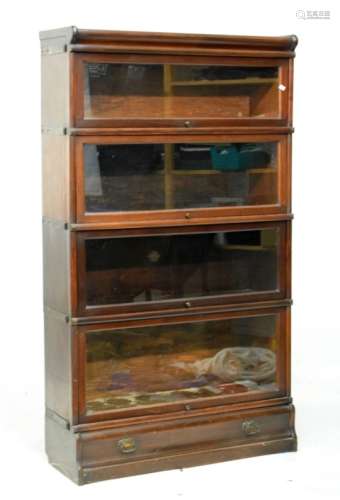 Early 20th Century Globe Wernicke-style modular stacking bookcase of four sections with base