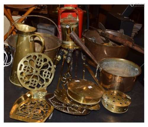 Large quantity of brass including preserve pans, trivets, companion sets, chestnut roasters etc
