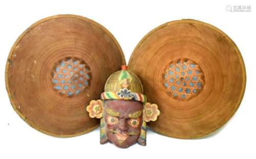 Carved wooden polychrome decorated South East Asian wall mask and two woven palm wool brimmed hats