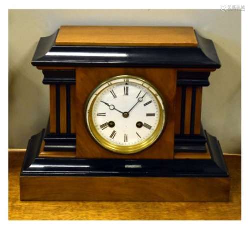 Early 20th Century walnut and ebonised cased mantel clock having white enamel dial