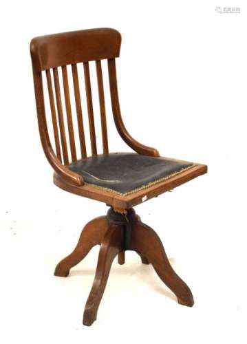 Early 20th Century oak swivel lath back desk chair