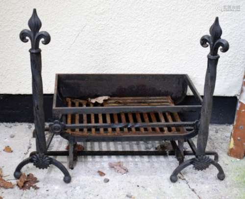 Wrought iron fire basket with pair of dogs, the basket 58cm wide x 33cm deep