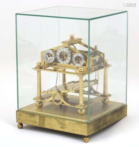 Gilt Brass Congreve rolling ball clock by Dent and Co of London, with fusee movement and three
