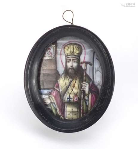 Antique Russian enamel icon hand painted with a St Joseph, housed in an ebonised framed, script to