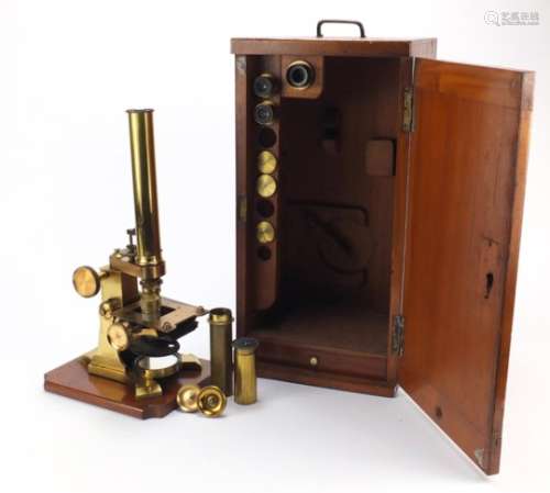 Victorian brass microscope with accessories and case by J & C Arobbins of London, 34.5cm high :