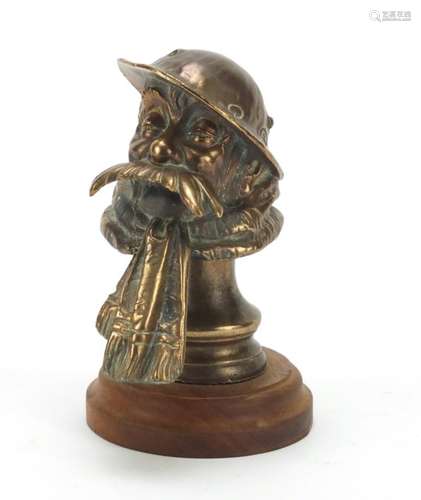 Bruce Bairnsfather car mascot raised on a wood stand, the mascot 12.5cm high : For Further Condition