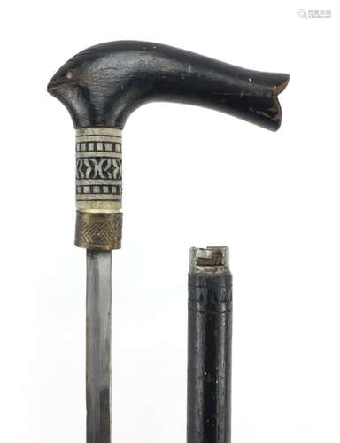 Indian ebonised sword stock with carved bone section, 86cm in length : For Further Condition Reports