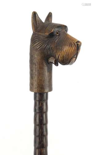 Bamboo walking stick with black forest dogs head design pommel, having moveable mouth, 91cm in