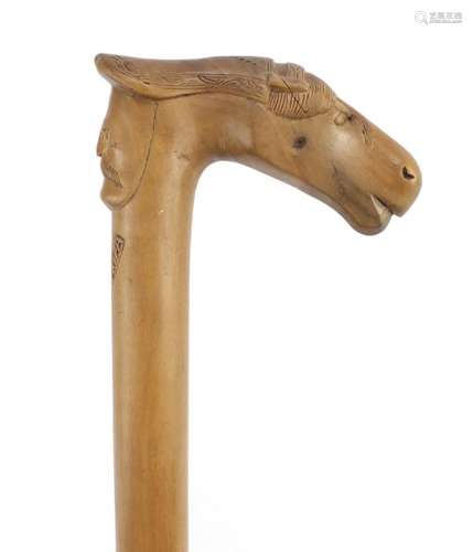 Continental walking stick with carved Cypriot head and horse head handle, 89cm in length : For