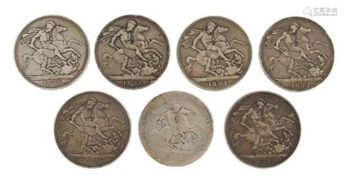 Seven George III and later crowns comprising dates 1819, 1888, 1889, 1889, 1892, 1897 and 1898 : For