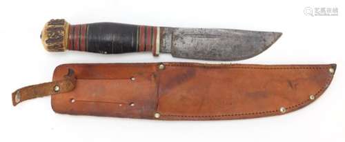 Military interest commando knife with leather sheath by Wade & Butcher of Sheffield, the steel blade