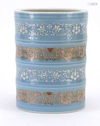 Chinese porcelain brush pot finely enamelled with bands of flower heads and foliage, six figure