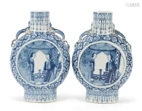 Pair of Chinese blue and white porcelain moon flasks with twin handles, each hand painted with