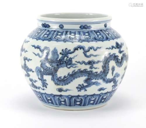 Chinese blue and white porcelain jar, hand painted with dragons amongst clouds within rui head