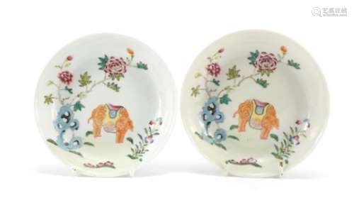 Pair of Chinese porcelain dishes, each finely hand painted in the famille rose palette with an