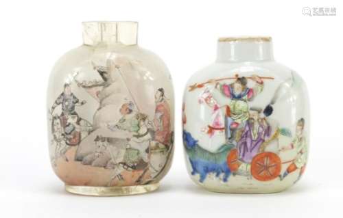 Two Chinese snuff bottles including a porcelain example finely hand painted with figures and