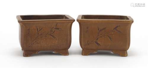 Pair of Yixing terracotta planters incised with flowers and calligraphy, impressed character marks
