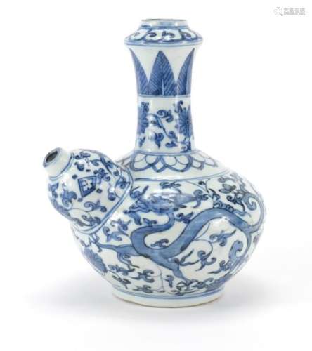 Chinese blue and white porcelain Kendi, hand painted with two dragons amongst flower and foliage,