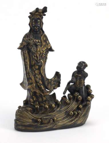 Chinese porcelain figure of Guanyin and a child, 24.5cm high : For Further Condition Reports