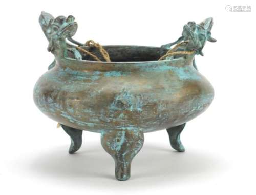 Chinese bronze tripod incense burner with twin handles, character marks to the base, 15.5cm high x