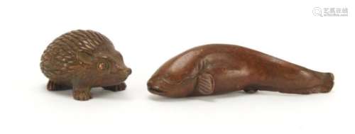 Japanese patinated bronze catfish and hedgehog, impressed marks to the undersides, the largest 6cm