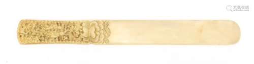 Chinese Canton ivory page turner carved with figures amongst pagodas, 26.5cm in diameter : For