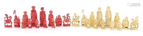 Good Chinese half stained part carved ivory chess set including kings and queens, the largest each
