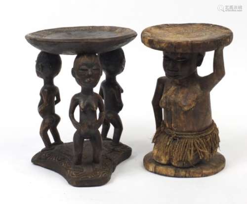 Two African tribal carved wood stools with beadwork, the largest 41cm high x 31.5cm in diameter :
