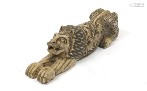 Antique Islamic stone carving of a recumbent mythical lion, 66cm in length : For Further Condition