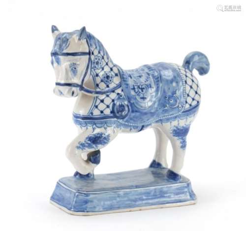 Dutch delft hand painted model of a horse, inscribed to the base, 22cm high : For Further