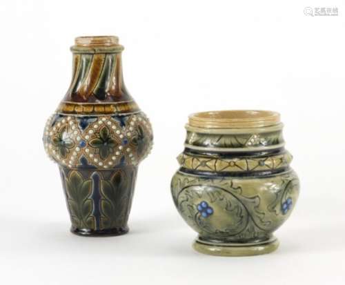 Two stoneware vases in the style of Martin Brothers, each incised and hand painted with flower heads